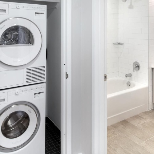 a washing machine in a bathroom