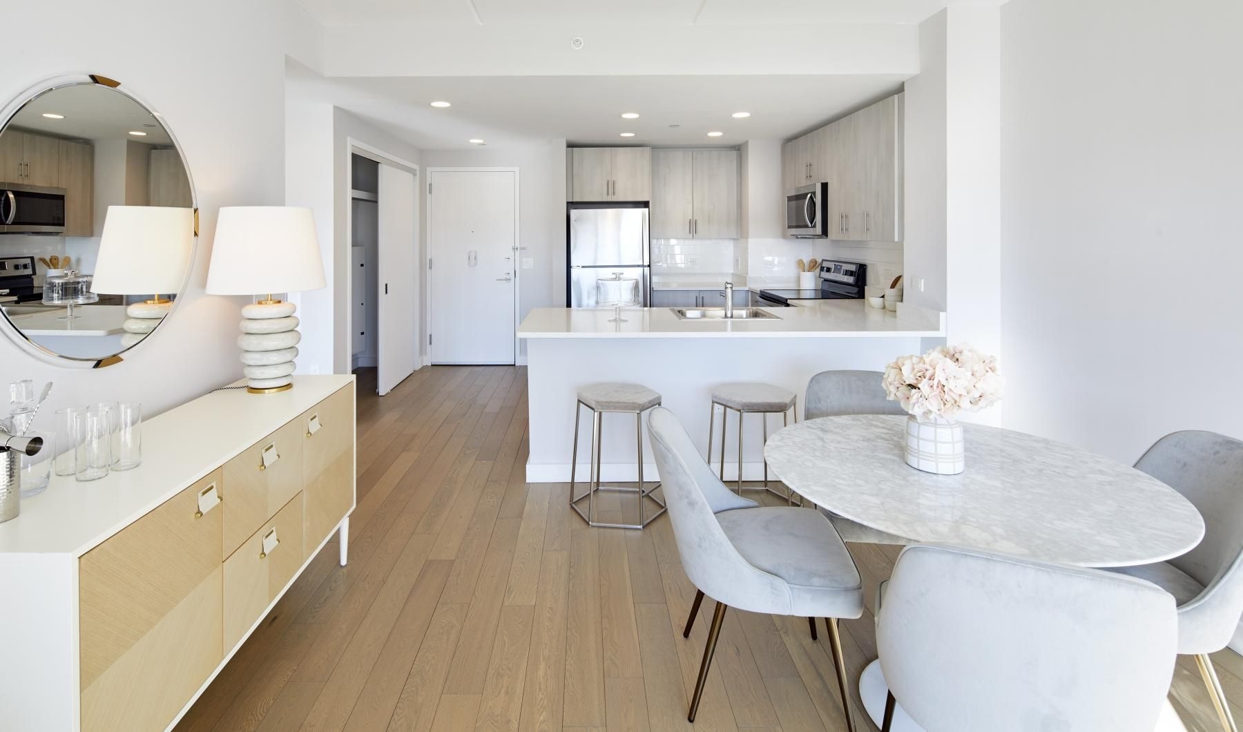 A perfect fit for the whole family a kitchen with a dining table and chairs