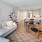 a living room with a couch and a dining table