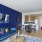 a living room with a blue couch