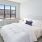 a bedroom with a bed and desk